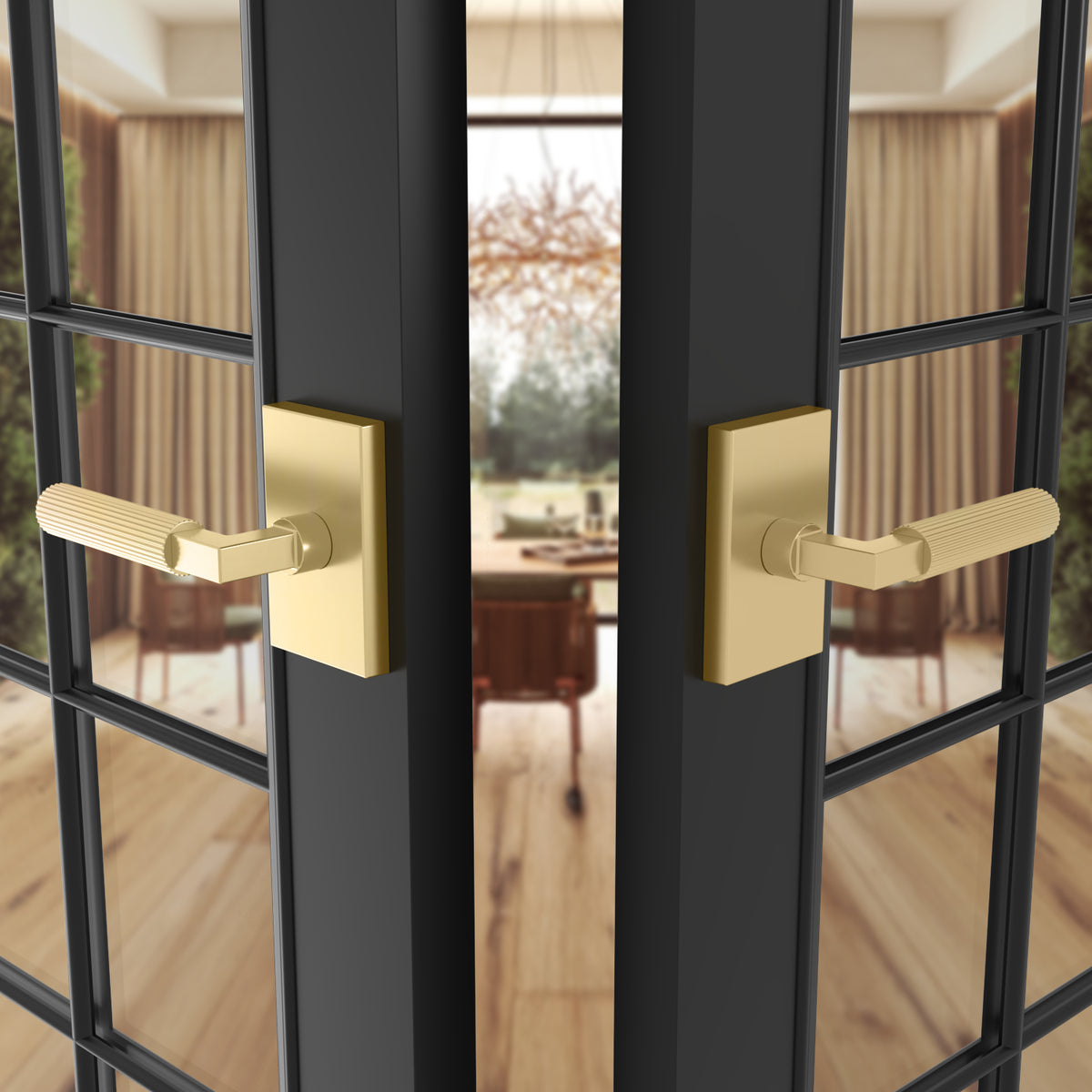 Ridge Satin Brass grooved levers installed on both sides of black double doors