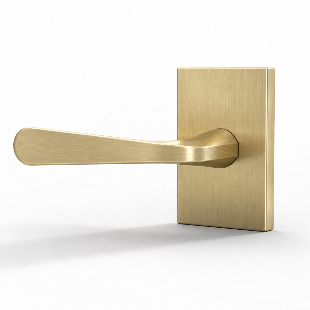 Serrano Collection | Spoon Shaped Lever in satin brass on a white background