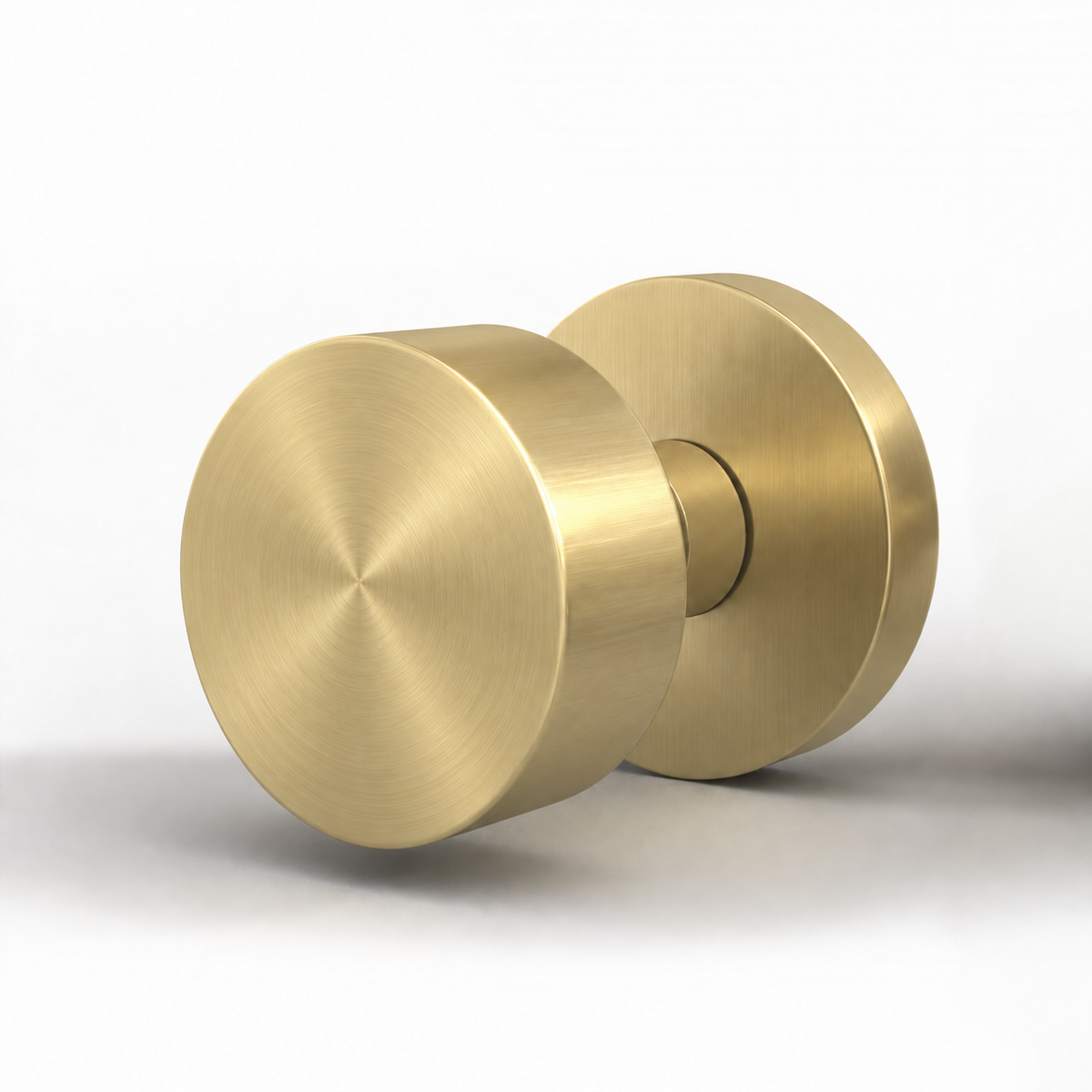 Buena Collection in satin brass on a white background