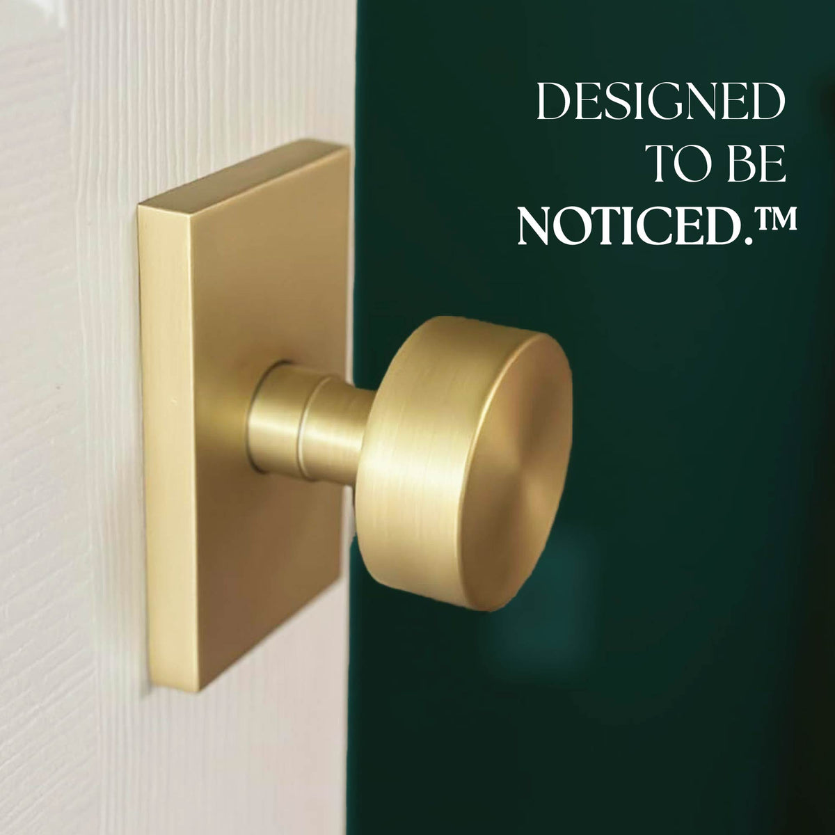Close-up of a Laura Satin Brass dummy knob installed on a light door