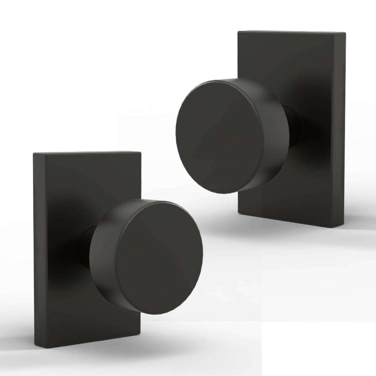 Two Laura Matte Black round door knobs on slim rectangular rosettes